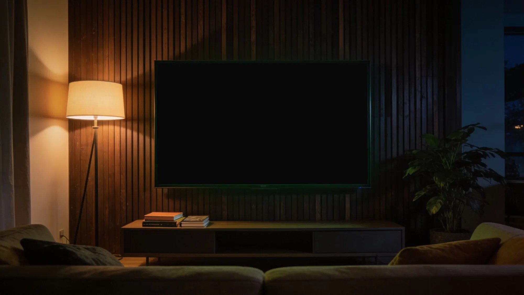 Living room with a TV on a walnut slat wall